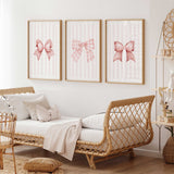Pink bow nursery wall decor set with soft feminine tones