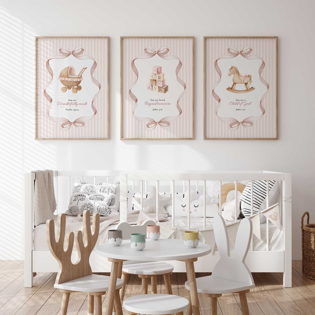 Set of three pink Christian nursery prints with Bible verses, bows and vintage toy illustrations for a baby girl
