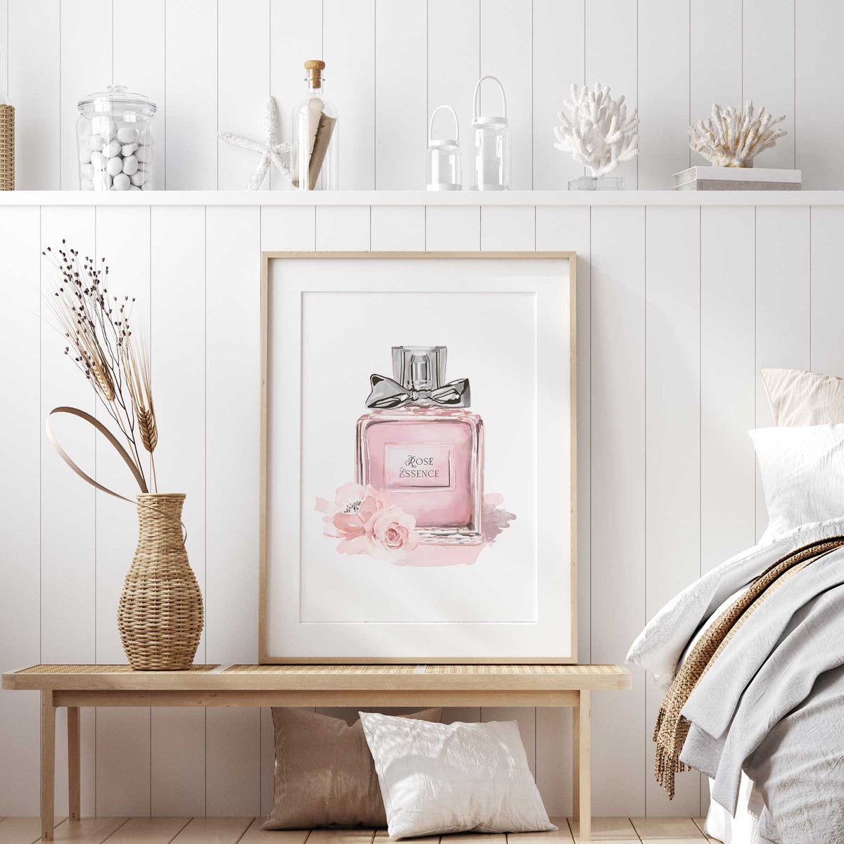 Floral fashion wall art featuring a soft pink perfume bottle and delicate flowers in a watercolour-inspired design.