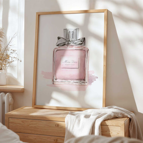 Pink perfume bottle fashion illustration with silver bow detail and soft blush tones