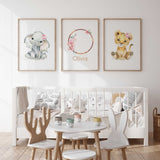 Pink safari wall art set for a girl nursery with elephant personalised wreath print and lion