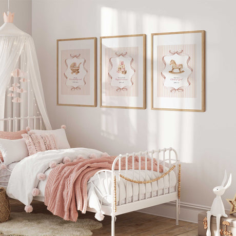 Pink Scripture wall art set of three with coordinating bows and classic toy illustrations for a little girls room