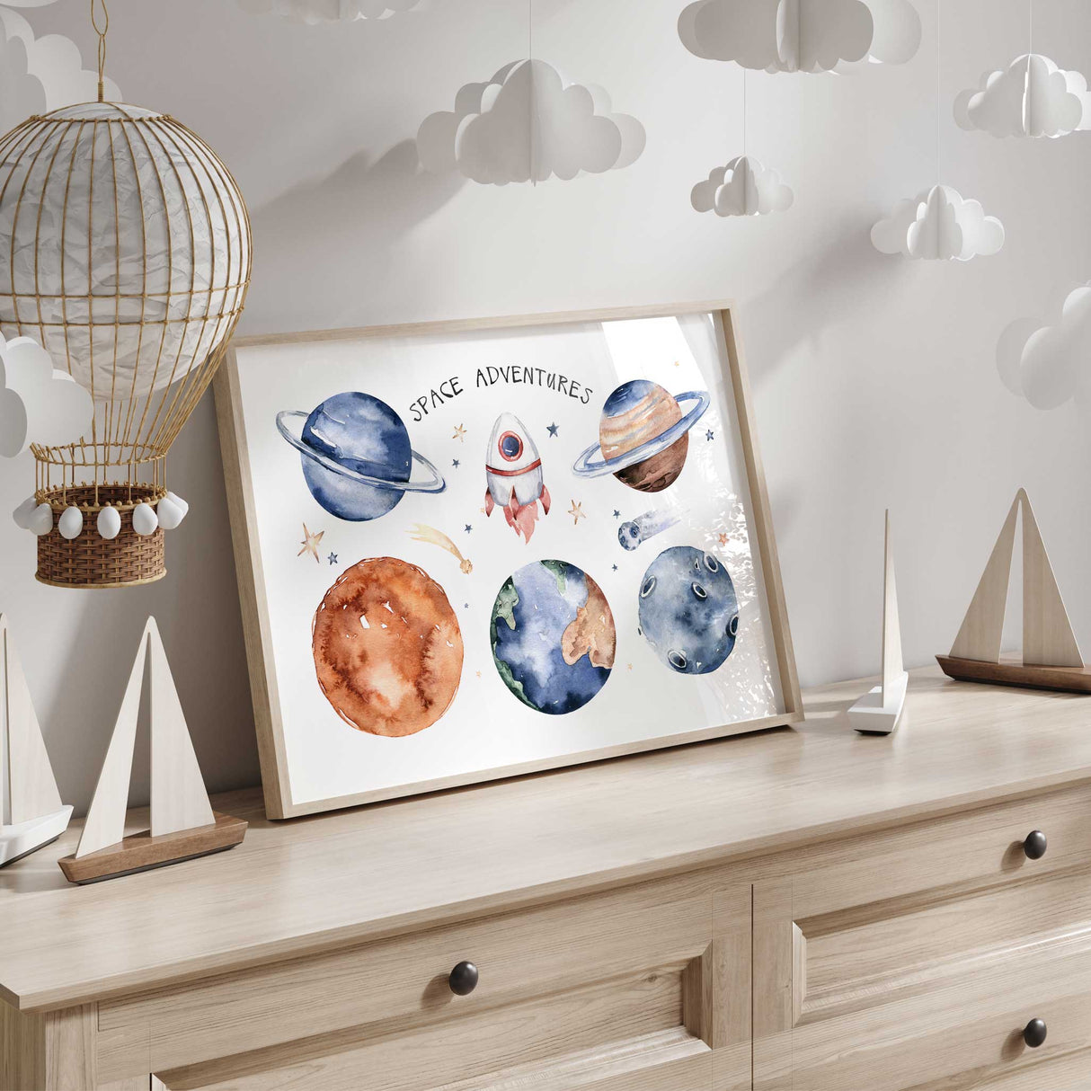 Boys wall art featuring colourful planets and stars, perfect for a space-themed bedroom.