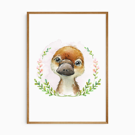 Baby platypus watercolour portrait with brown fur, a green leafy wreath, small pink flowers and a pale pink wash.