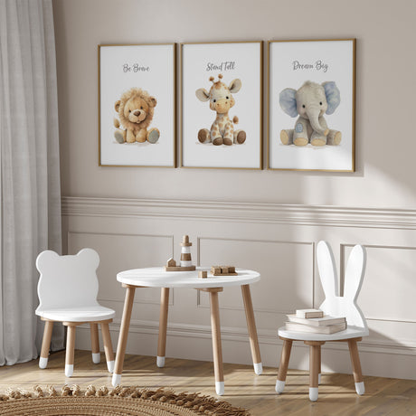 Plush safari animal nursery gallery wall with lion, elephant, and giraffe prints