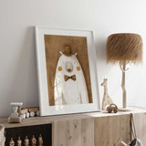 Polar bear wall art with a tall striped hat, spotted brown bow tie and textured ochre brown background behind the cream bear.