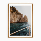 Positano coastal photography print showing rugged Italian cliffs and deep blue Mediterranean water viewed from a boat