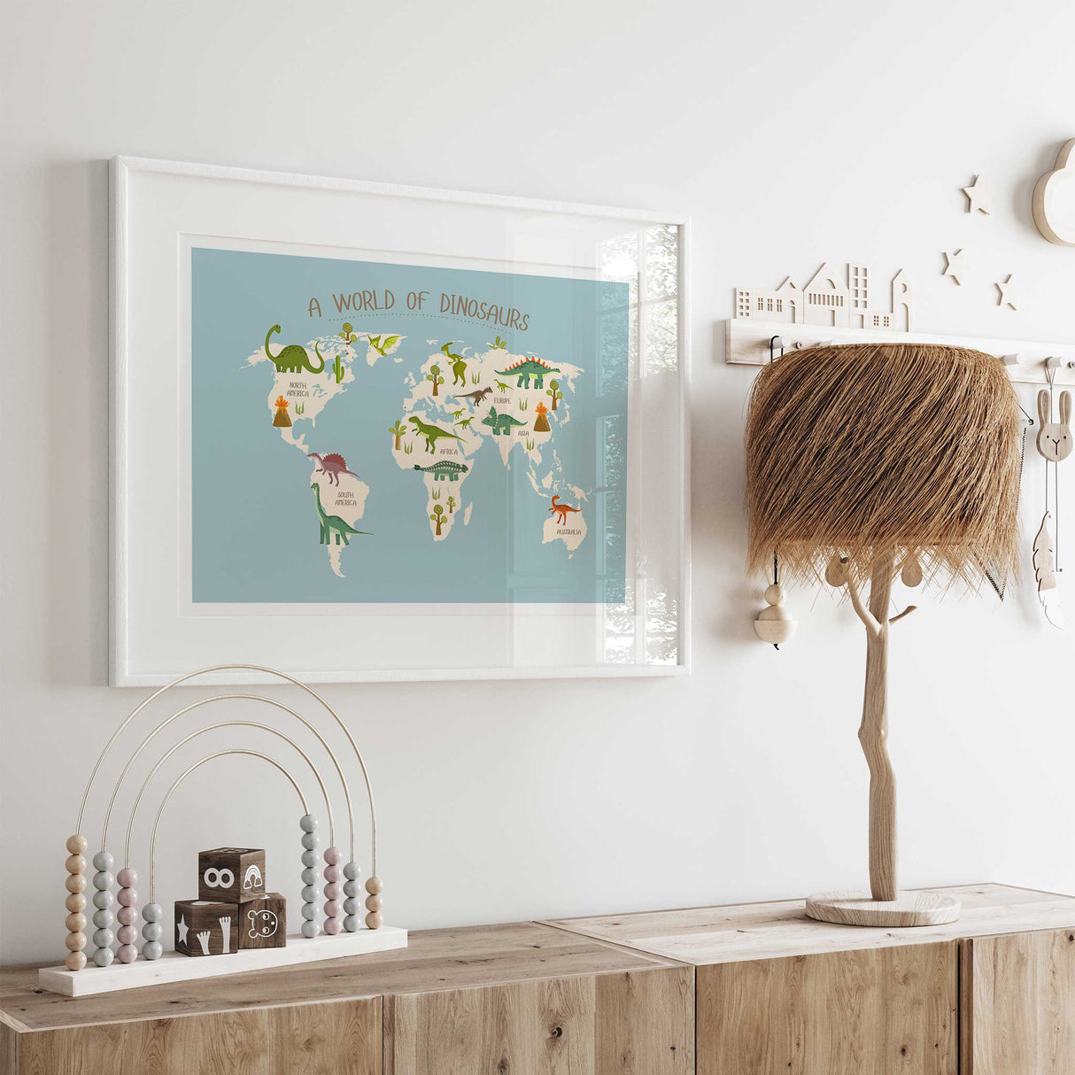 Prehistoric world map poster with dinosaurs and continent names for a child’s bedroom or playroom.