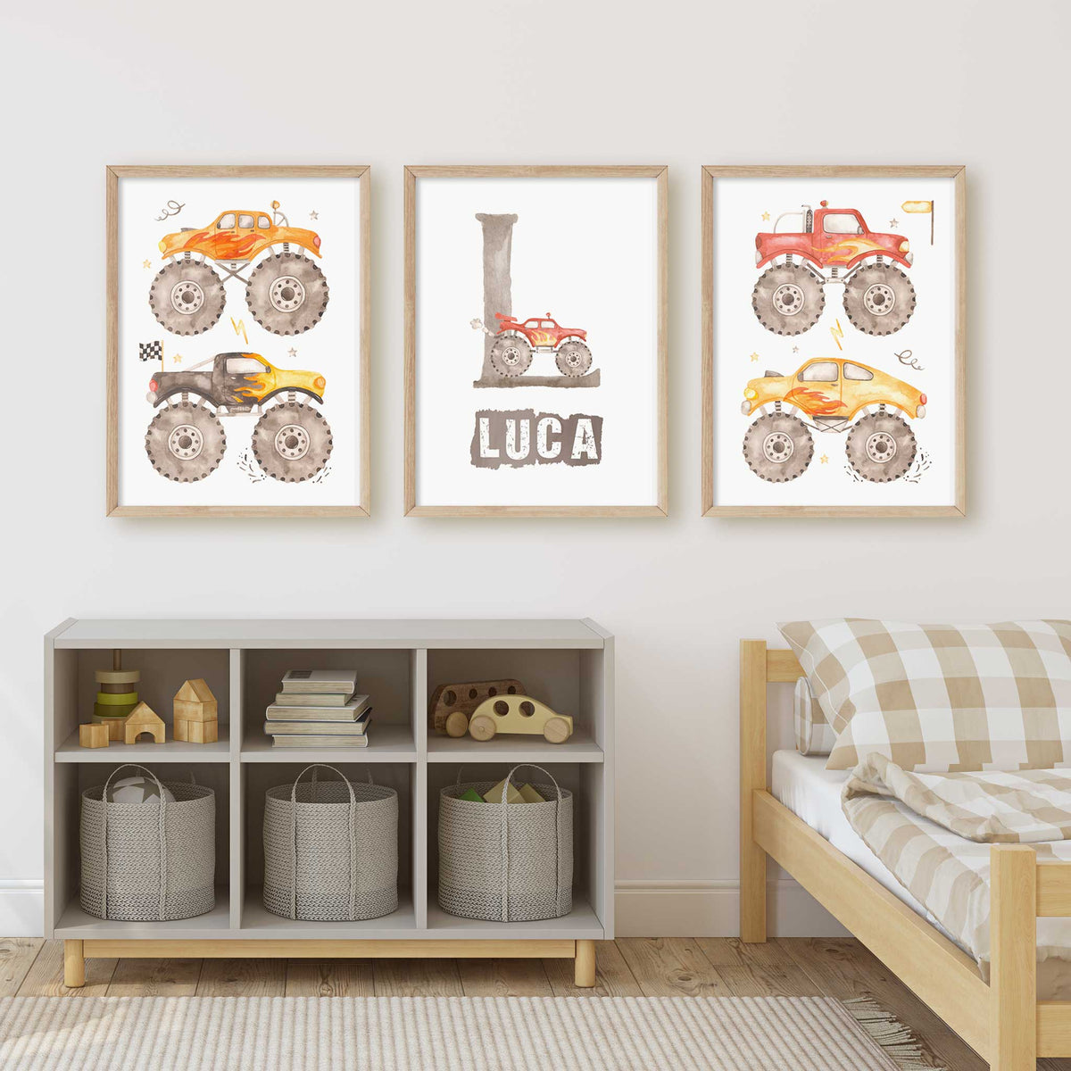 Red, orange and yellow monster truck print set with flame graphics and a personalised initial for a child’s bedroom.