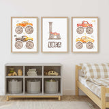Red, orange and yellow monster truck print set with flame graphics and a personalised initial for a child’s bedroom.
