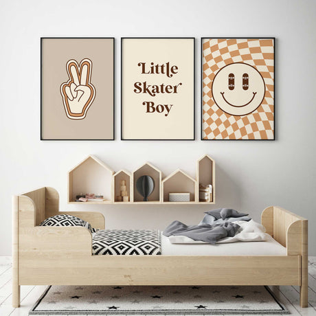 Retro skater wall art trio featuring a peace hand, Little Skater Boy lettering and a tan checkerboard smiley face.