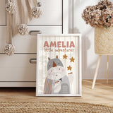 Personalised rhino wall print with child’s name, little adventurer wording and a soft striped safari background.