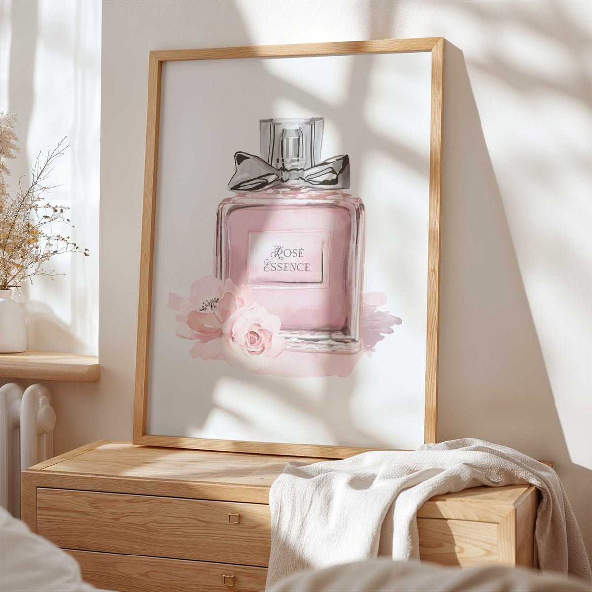 Rosé Essence floral perfume print featuring a blush pink fragrance bottle and delicate flowers in a soft pink palette.