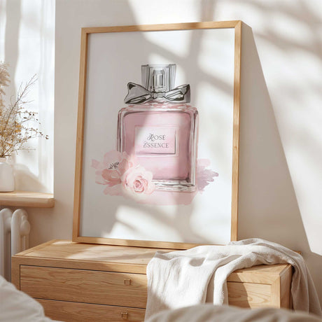Rosé Essence floral perfume print featuring a blush pink fragrance bottle and delicate flowers in a soft pink palette.