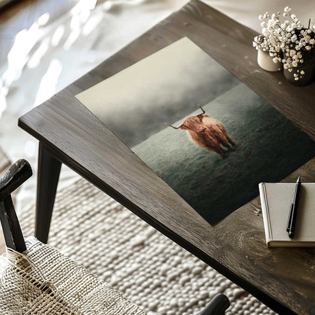 Cozy modern bedroom with Highland cow artwork