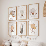 Set of musical animal prints with elephant, giraffe, tiger, tiger, rhino, and cheetah, perfect for safari or music themed nursery.