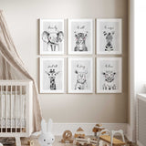 Giraffe nursery print with the phrase ‘stand tall’ in a fun and friendly font.