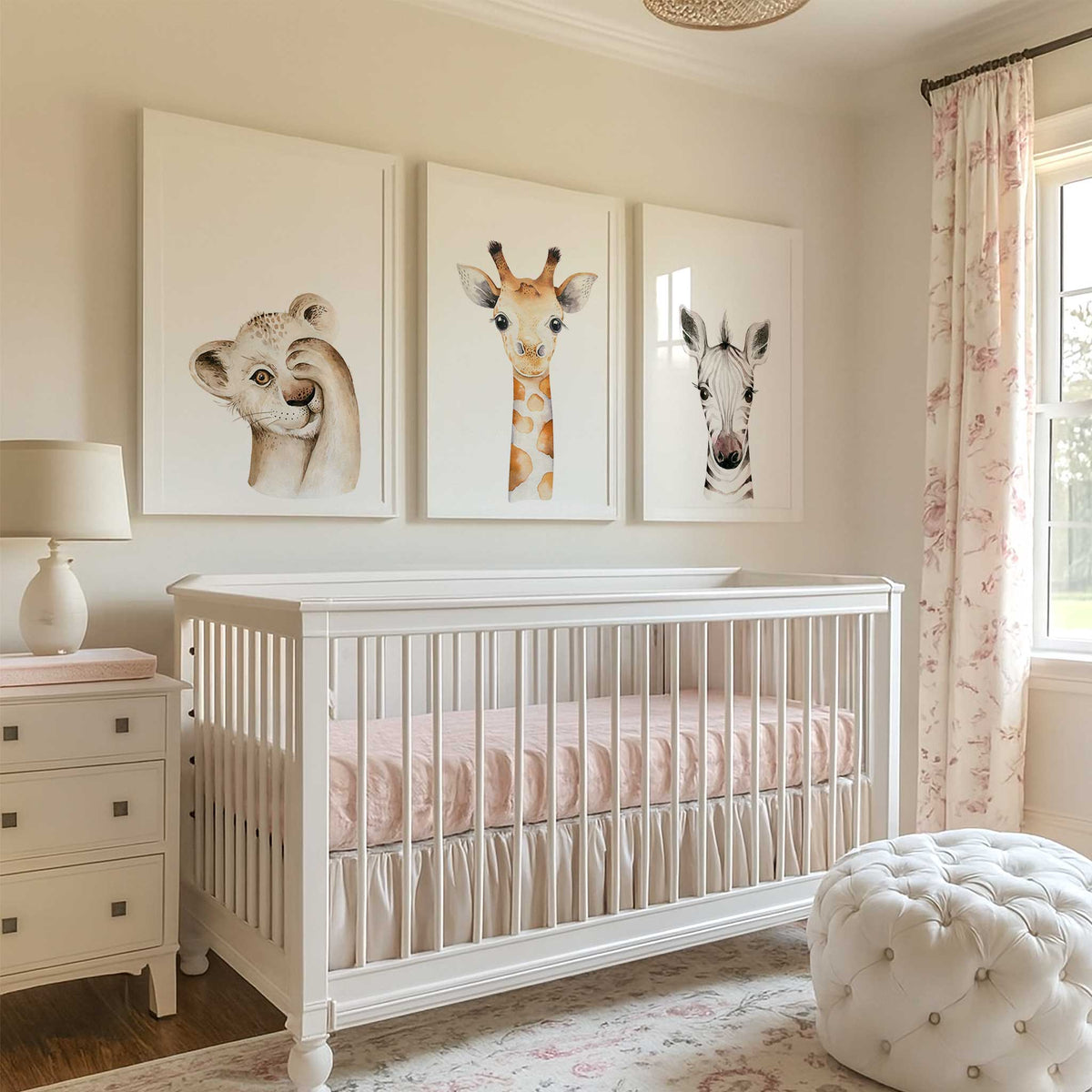 Baby lion, giraffe and zebra nursery prints with soft watercolour detail and natural colours, supplied as a set of three.