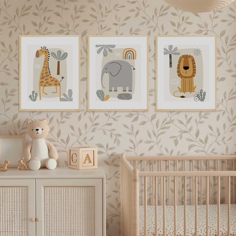 safari nursery wall art set featuring giraffe, elephant and lion prints in warm earthy tones for baby room decor