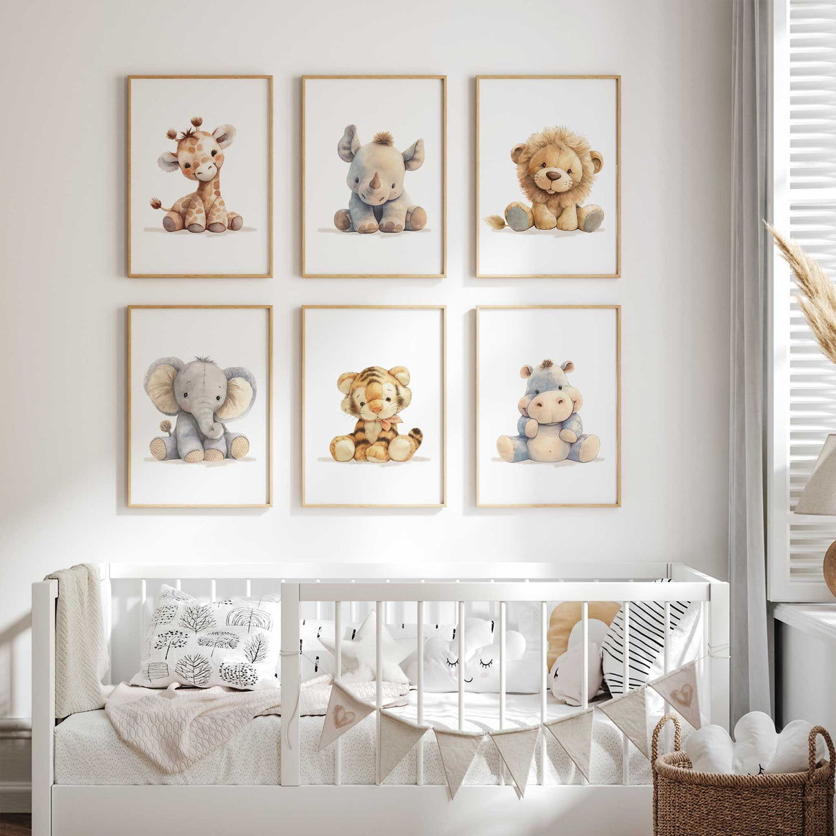 Jungle-themed nursery wall art with a set of 6 safari animal prints displayed above a crib in a baby room.