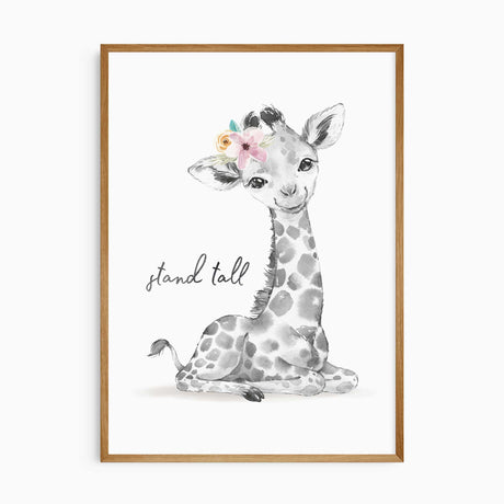 Watercolour giraffe nursery print with quote “Stand tall,” featuring a floral crown in soft pastel tones, perfect wall art for girls safari-themed nursery or bedroom.