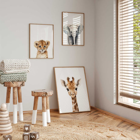 Safari-themed kids' room wall decor with framed baby animal prints to create a cohesive gallery wall.