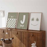 Sage green boys wall art set with personalised initial name print, checkerboard quote and palm tree smiley for kids bedroom or nursery 