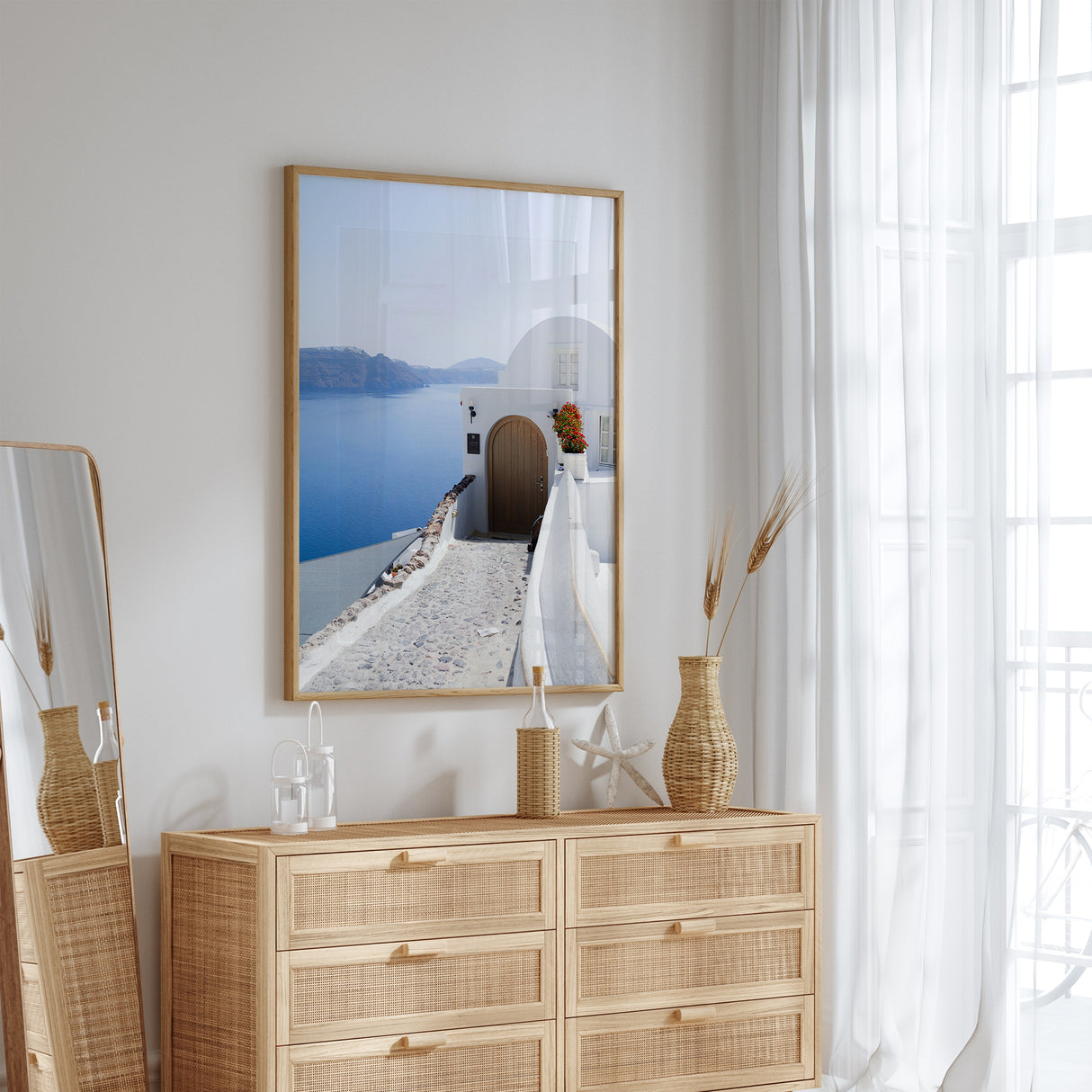 Santorini blue sea wall art overlooking the Aegean Sea and distant cliffs.