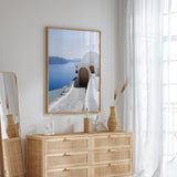 Santorini blue sea wall art overlooking the Aegean Sea and distant cliffs.