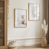 set of two mediterranean prints featuring white greek architecture and soft earthy tones