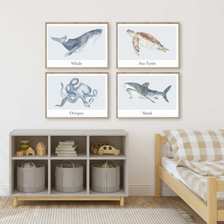 Four landscape sea animal prints featuring a whale, sea turtle, octopus and shark, with watercolour artwork and animal names.