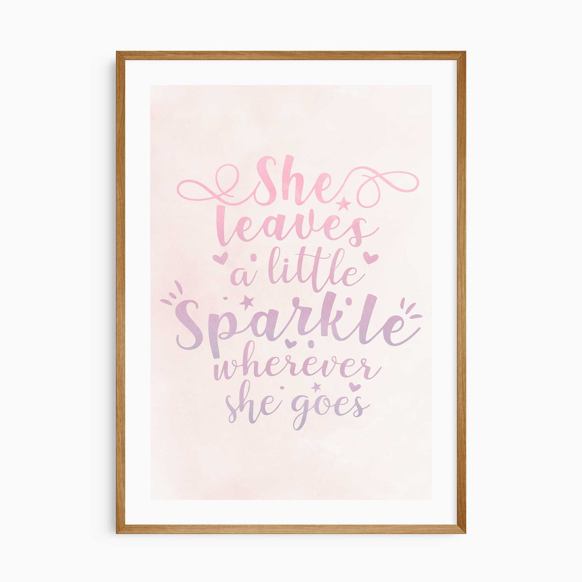 She leaves a little sparkle wherever she goes quote print with pink and lilac lettering, hearts and stars on pale pink.