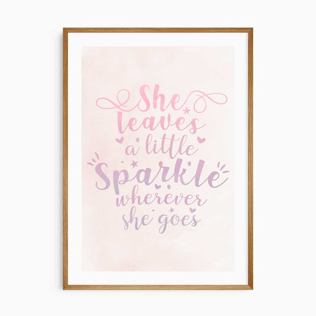 She leaves a little sparkle wherever she goes quote print with pink and lilac lettering, hearts and stars on pale pink.