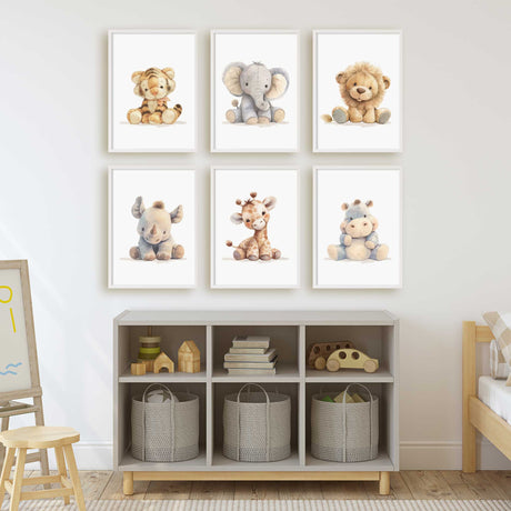 Six baby animal nursery prints with tiger, elephant, lion, rhino, giraffe and hippo in coordinated soft toy style.