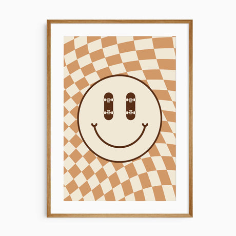 Smiley face wall art with skateboard eyes and a retro checkered background for boys room décor.