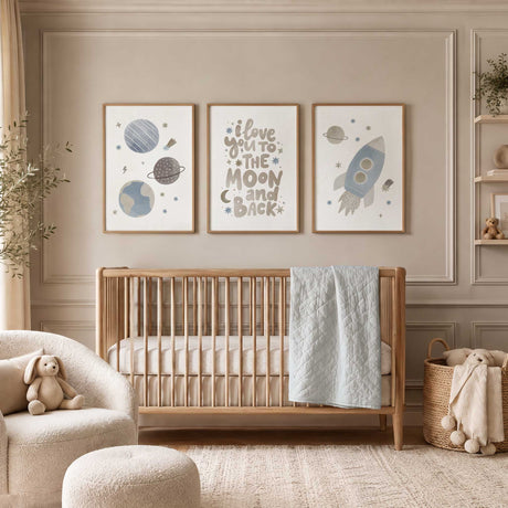 Space nursery wall art set of 3 featuring a rocket, planets and moon quote in soft blue and neutral tones for a baby boy nursery with the quote i love you to the moon and back