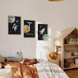 Set of three space themed prints featuring astronaut rocket and personalised initial for a boys bedroom or toddler