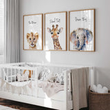 Three watercolour animal prints pairing a giraffe, elephant and lion cub with Stand Tall, Dream Big and Be Brave.