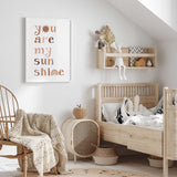 Sun and rainbow nursery print with You Are My Sunshine quote in warm earthy tones