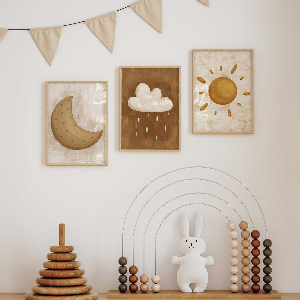 Set of three nursery prints featuring neutral sun, moon, and cloud designs for baby's room