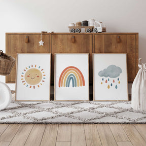Set of 3 nursery wall art prints with sun, rainbow, and cloud designs