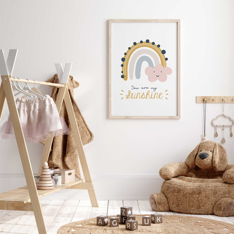 Pastel rainbow baby room wall art print with smiling cloud and sunshine lettering