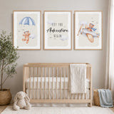 Teddy bear aviation print trio with a blue parachute, a plane with a blue-scarved bear and Let the Adventure Begin wording.