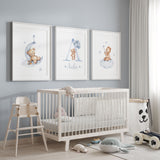 Teddy bear nursery wall art set featuring a teddy with balloons, sleeping moon bear and teddy on a cloud in soft blue watercolour tones for boys nursery decor