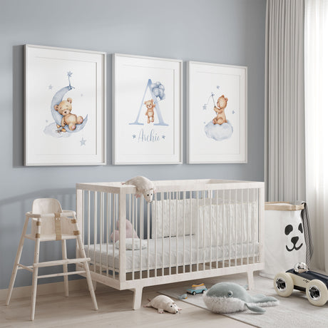 Teddy bear nursery wall art set featuring a teddy with balloons, sleeping moon bear and teddy on a cloud in soft blue watercolour tones for boys nursery decor