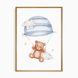 Watercolour teddy bear floating beneath a blue striped parachute with clouds and stars on a white background