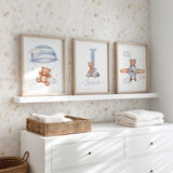 Teddy bear nursery set with a blue I initial and Isaiah name, a bear beneath a striped parachute and a plane bear.
