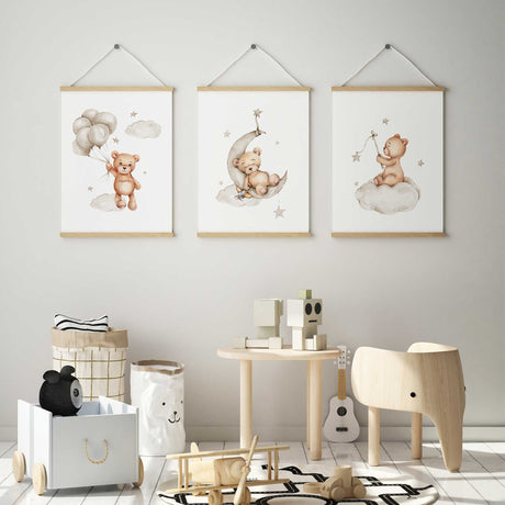Coordinating teddy bear prints with beige balloons, a sleeping bear on a moon and a cloud bear with a hanging star.