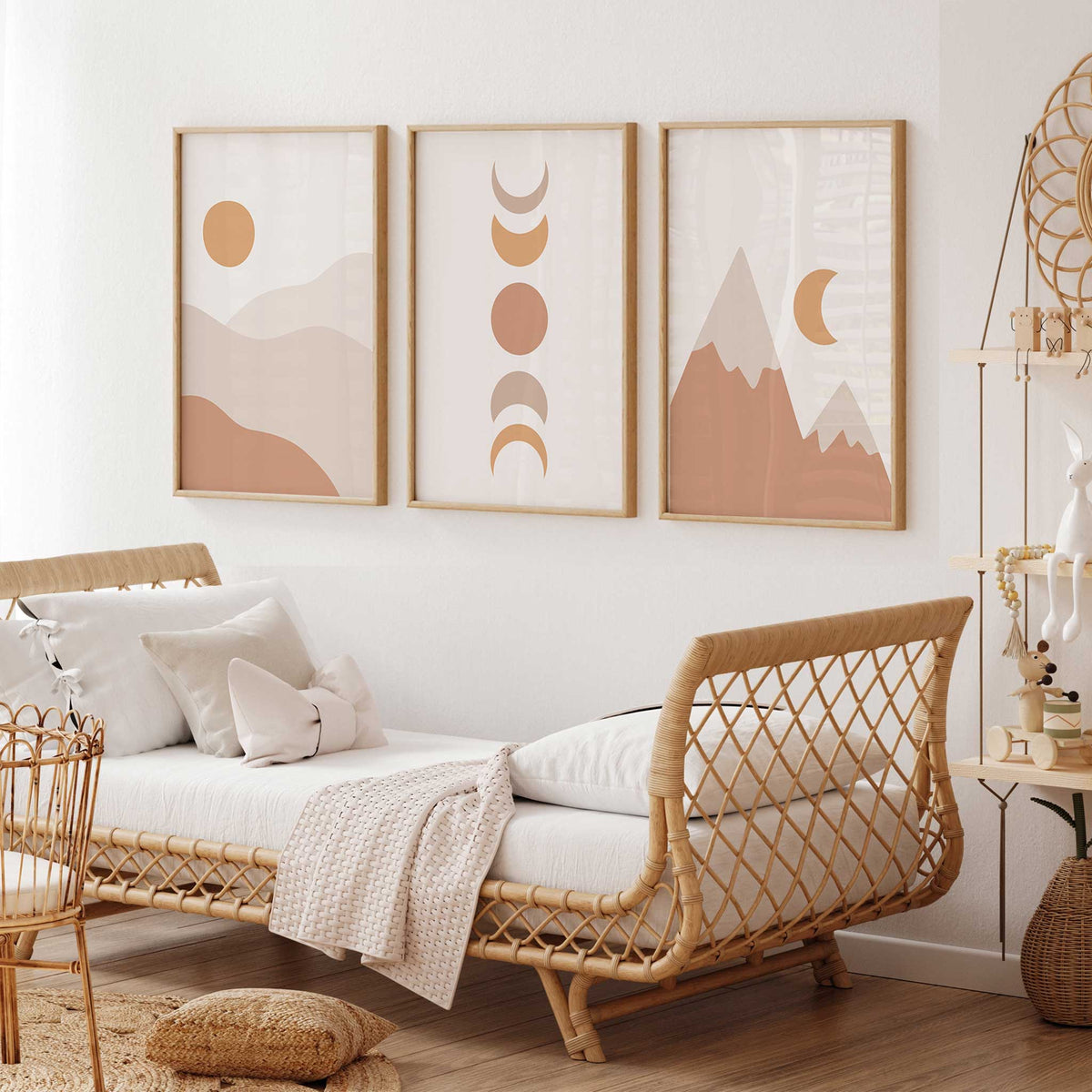 Coordinating sun, moon phase and mountain prints in terracotta, soft beige and ochre, with minimal geometric shapes.