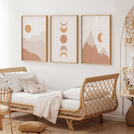 Coordinating sun, moon phase and mountain prints in terracotta, soft beige and ochre, with minimal geometric shapes.